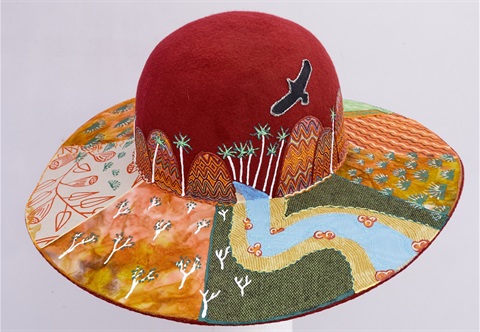 Felt hat adorned with colourful design